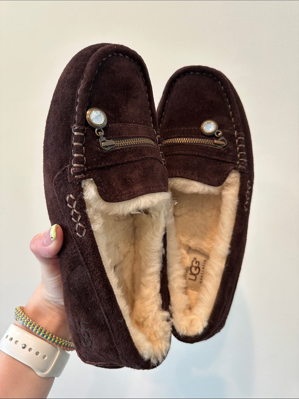 UGG women’s Dark Brown Suede Shearling-Lined Loafers with Decorative Zipper